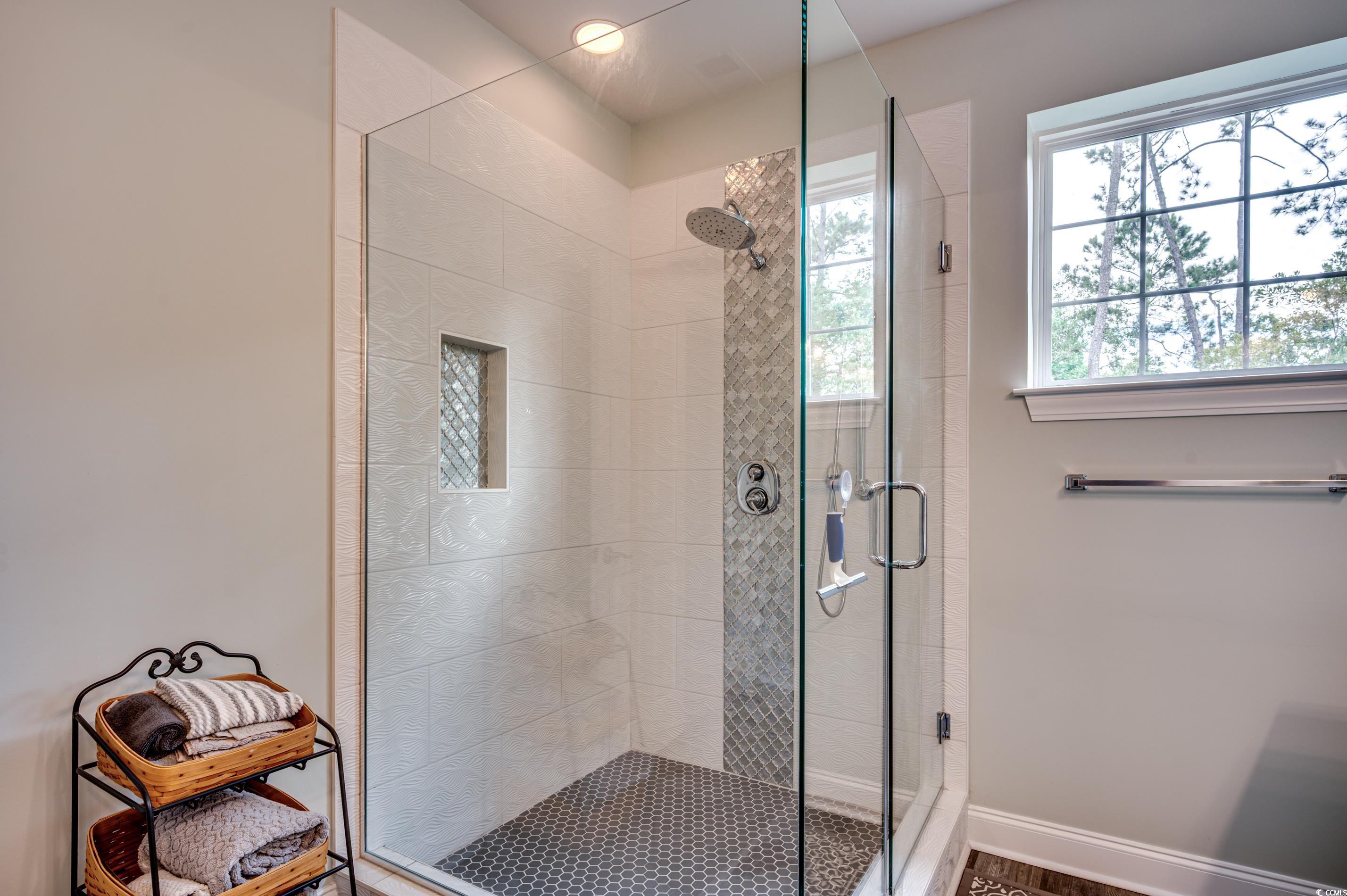 701 Pickering Drive, Unit 203 Murrells Inlet, SC 29576 - Photo 20 of 35 Natural lighting and LVP floors