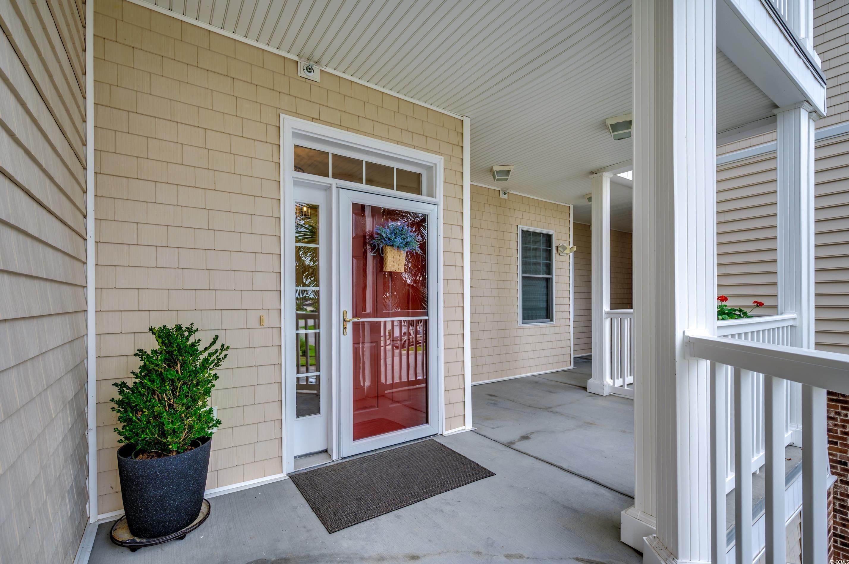 701 Pickering Drive, Unit 203 Murrells Inlet, SC 29576 - Photo 2 of 35 Storm door for energy efficiency