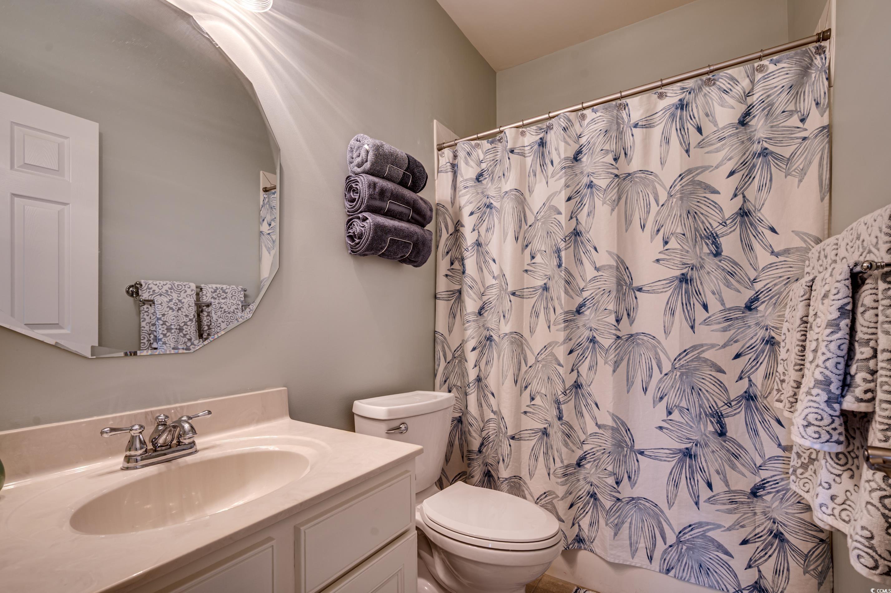 701 Pickering Drive, Unit 203 Murrells Inlet, SC 29576 - Photo 24 of 35 Full bath with vanity and tub/shower