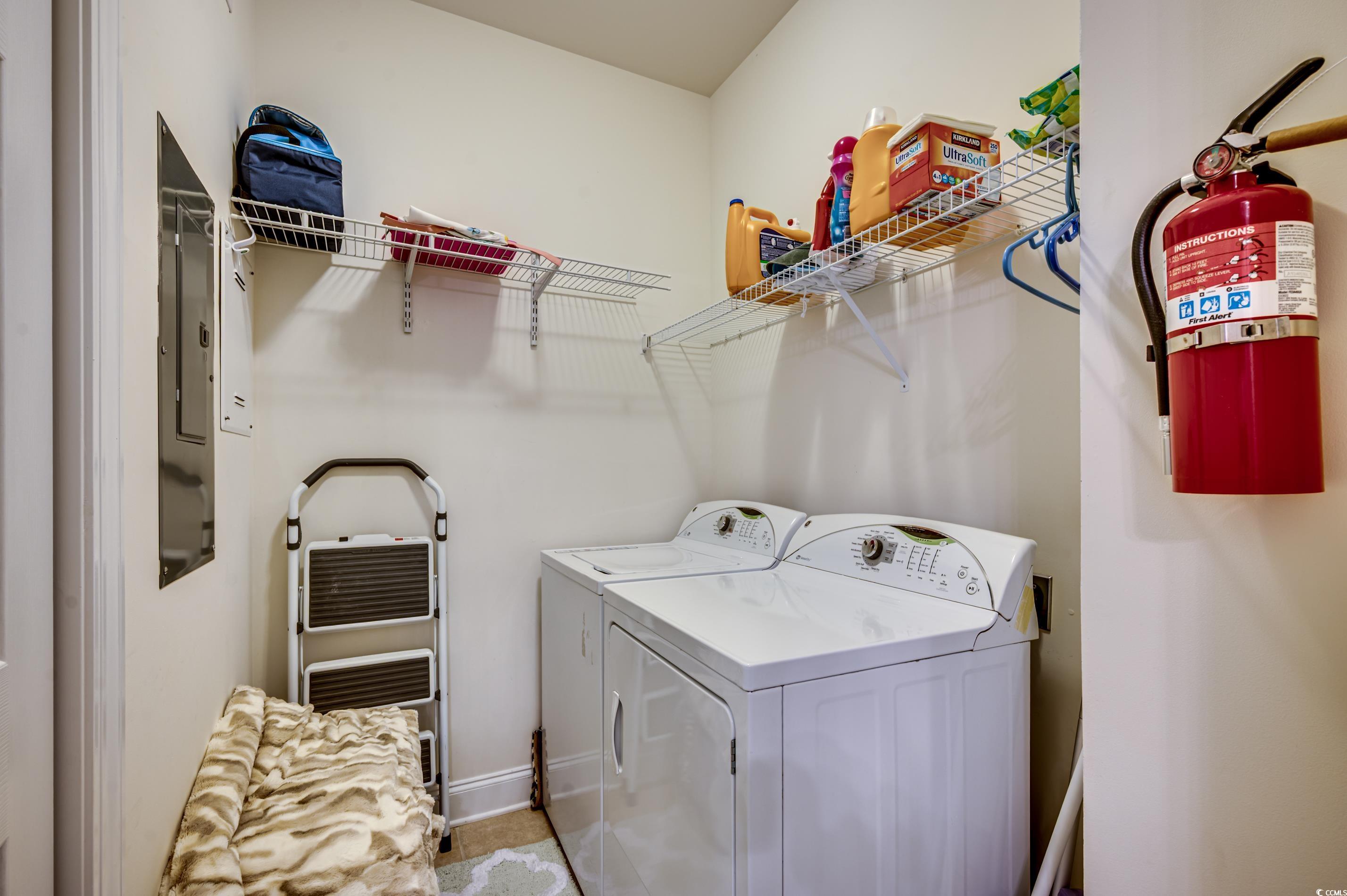 701 Pickering Drive, Unit 203 Murrells Inlet, SC 29576 - Photo 27 of 35 Laundry room featuring separate washer and dryer