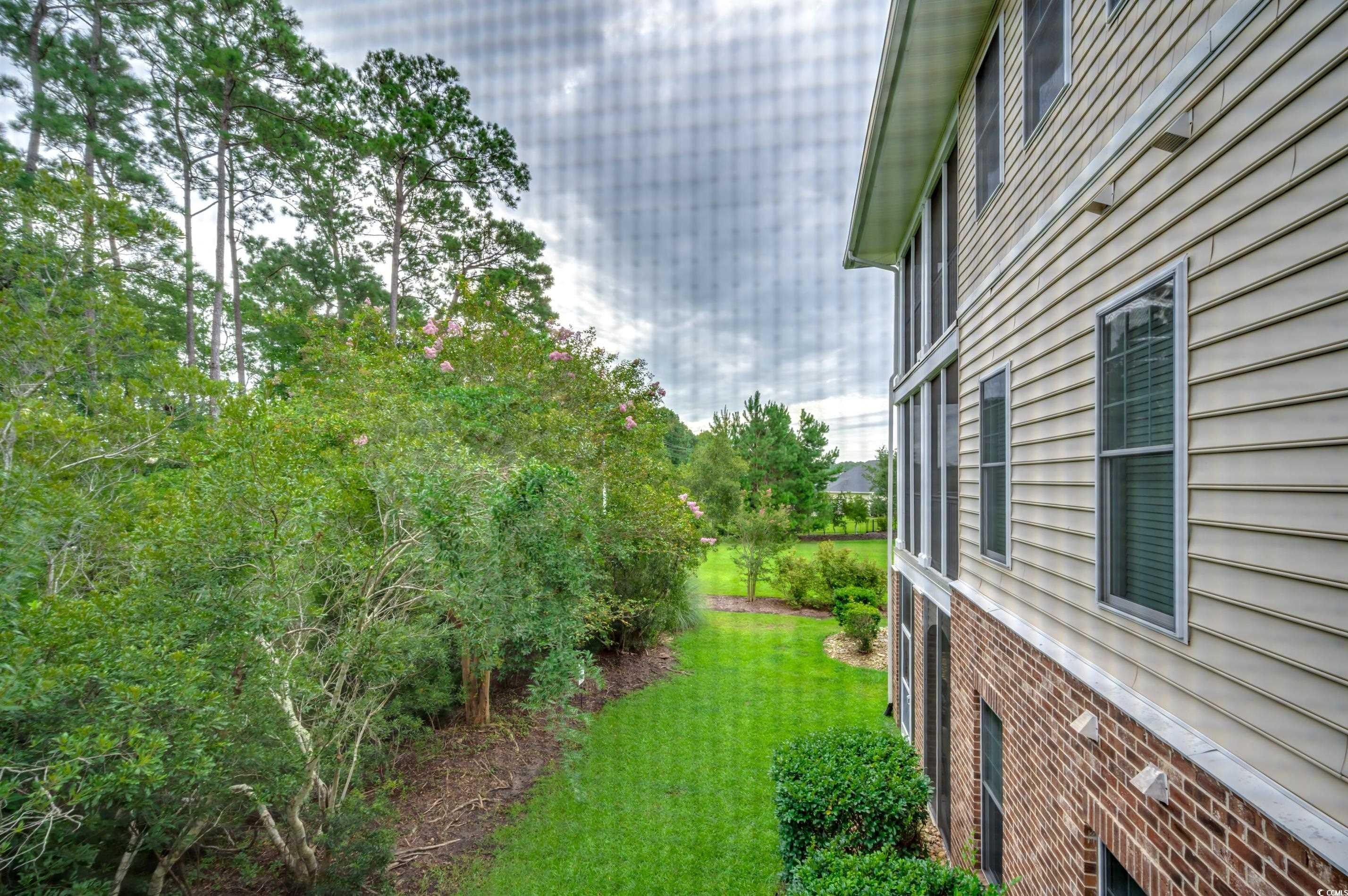 701 Pickering Drive, Unit 203 Murrells Inlet, SC 29576 - Photo 30 of 35 View of lawn!