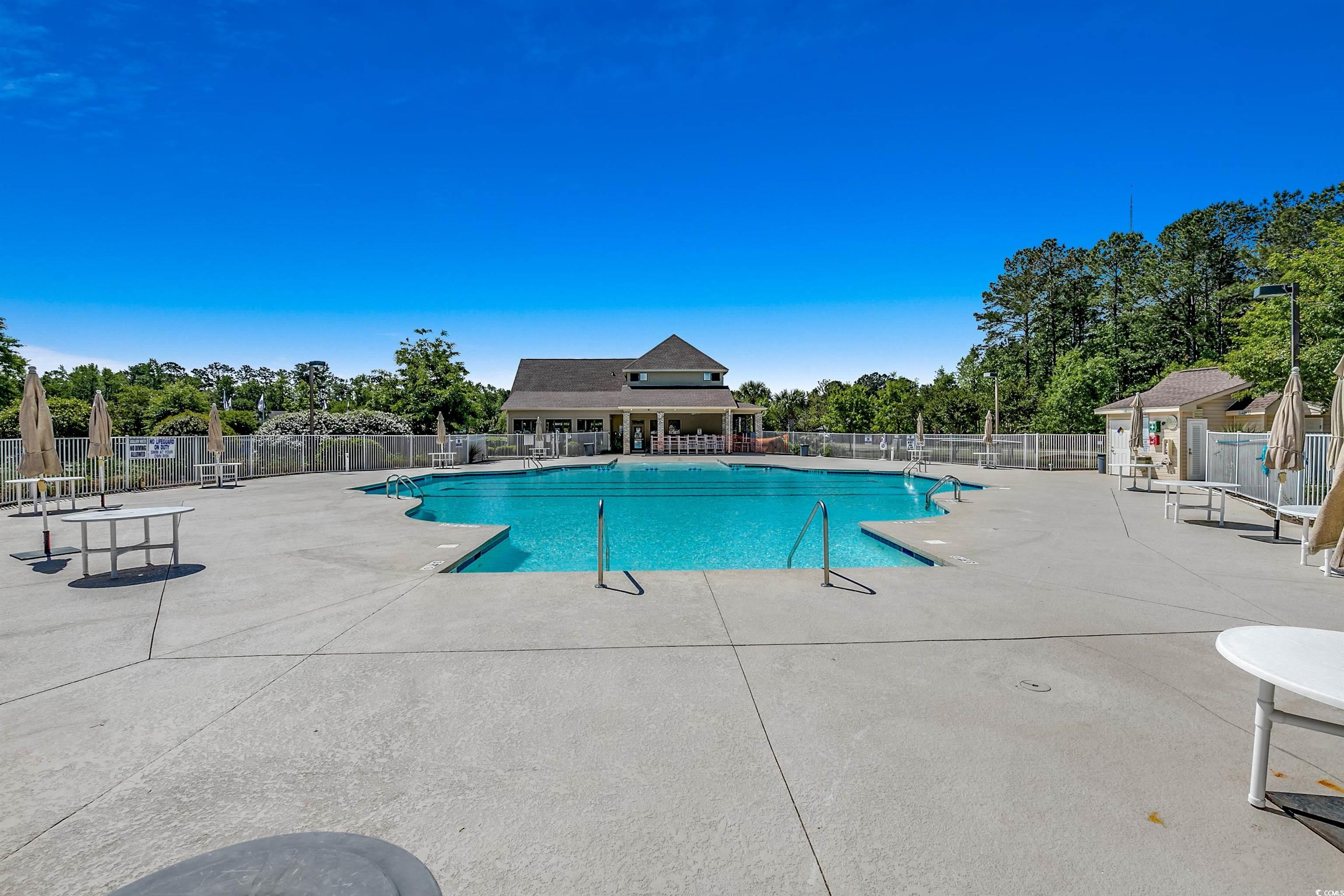701 Pickering Drive, Unit 203 Murrells Inlet, SC 29576 - Photo 33 of 35 Community pool nearby. Memberships available.
