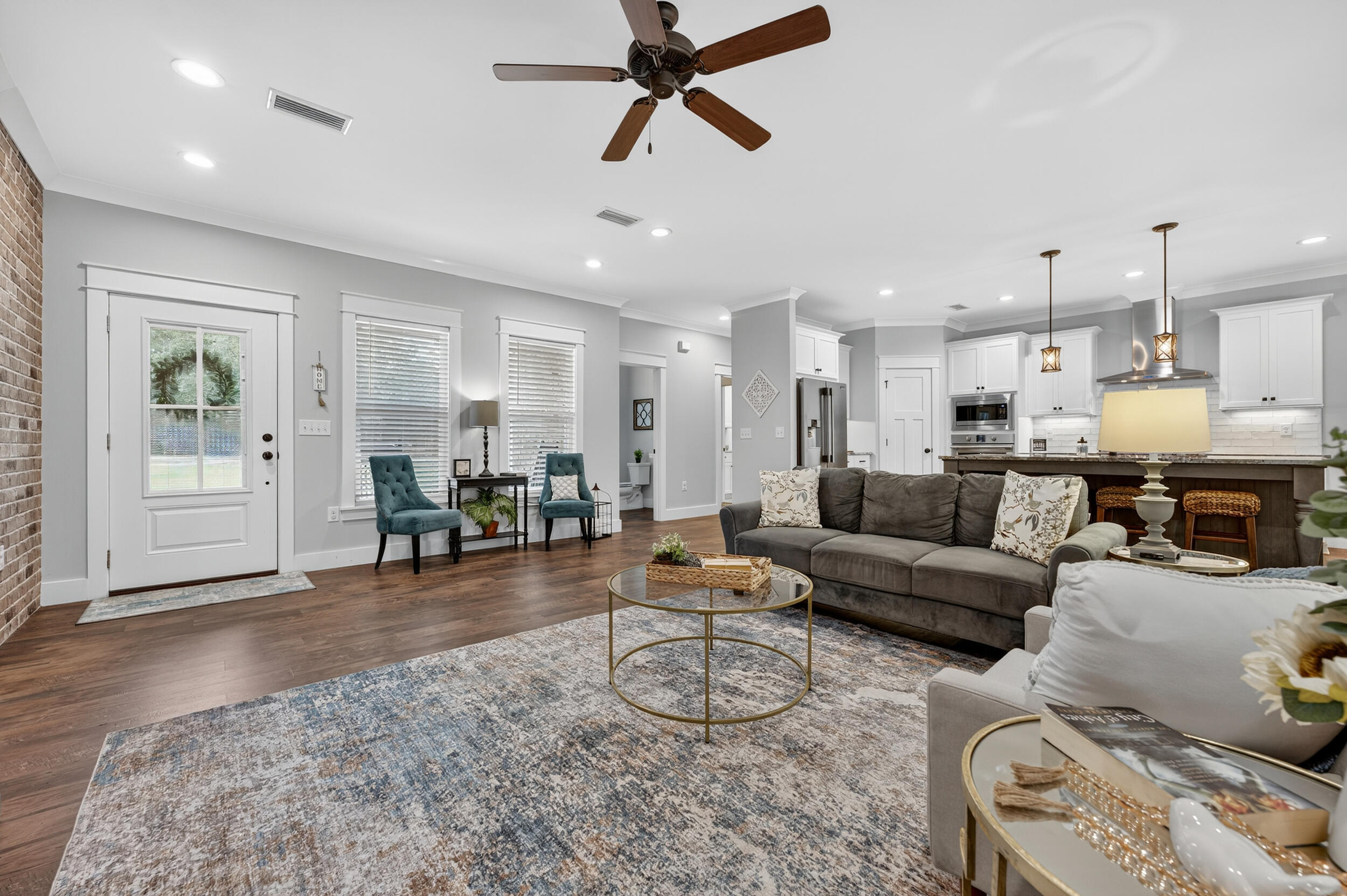 768 Long Road DeFuniak Springs, FL 32433 - Photo 11 of 106 a living room with furniture and kitchen view