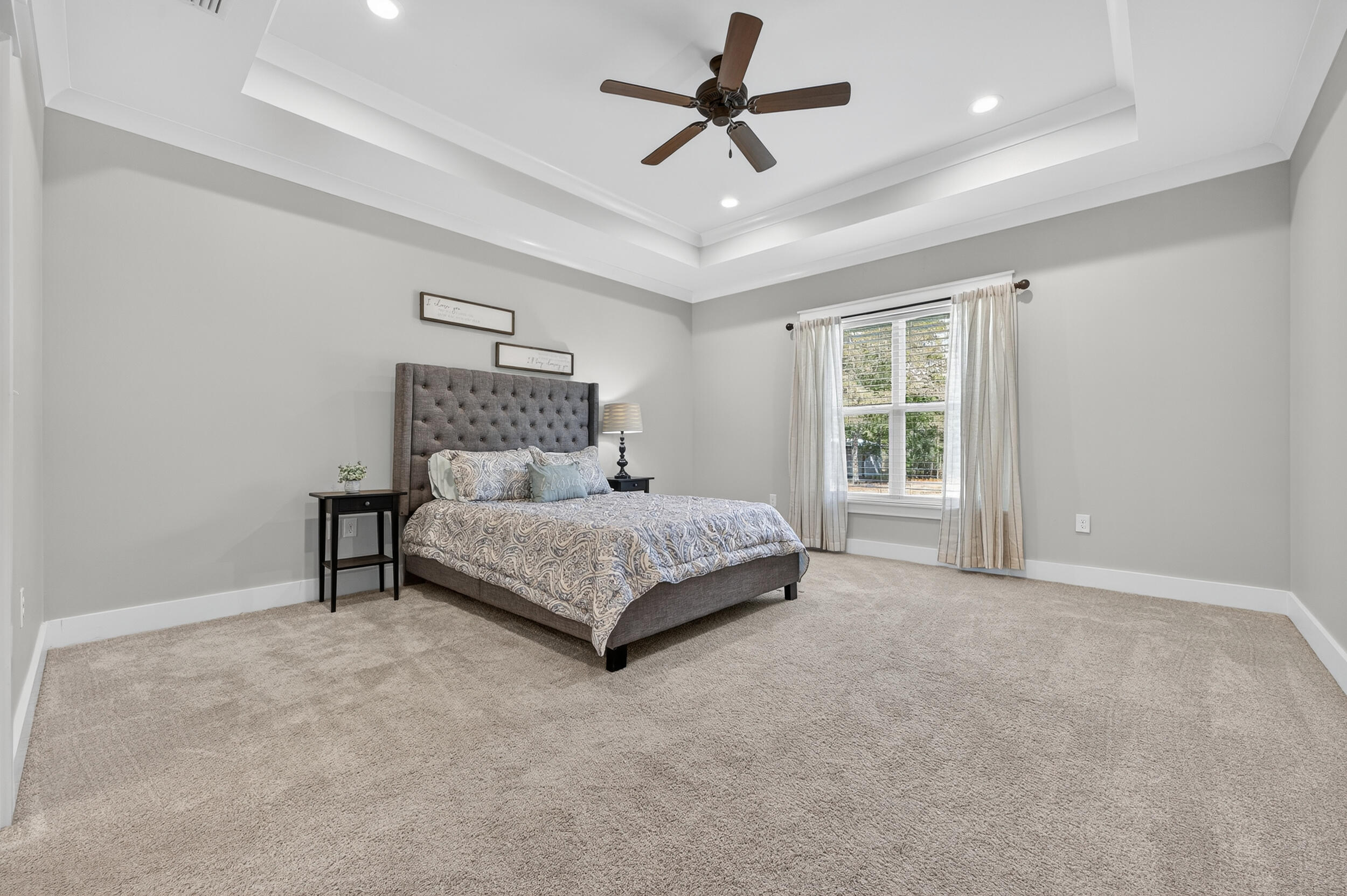 768 Long Road DeFuniak Springs, FL 32433 - Photo 30 of 106 a bedroom with a bed ceiling fan and window