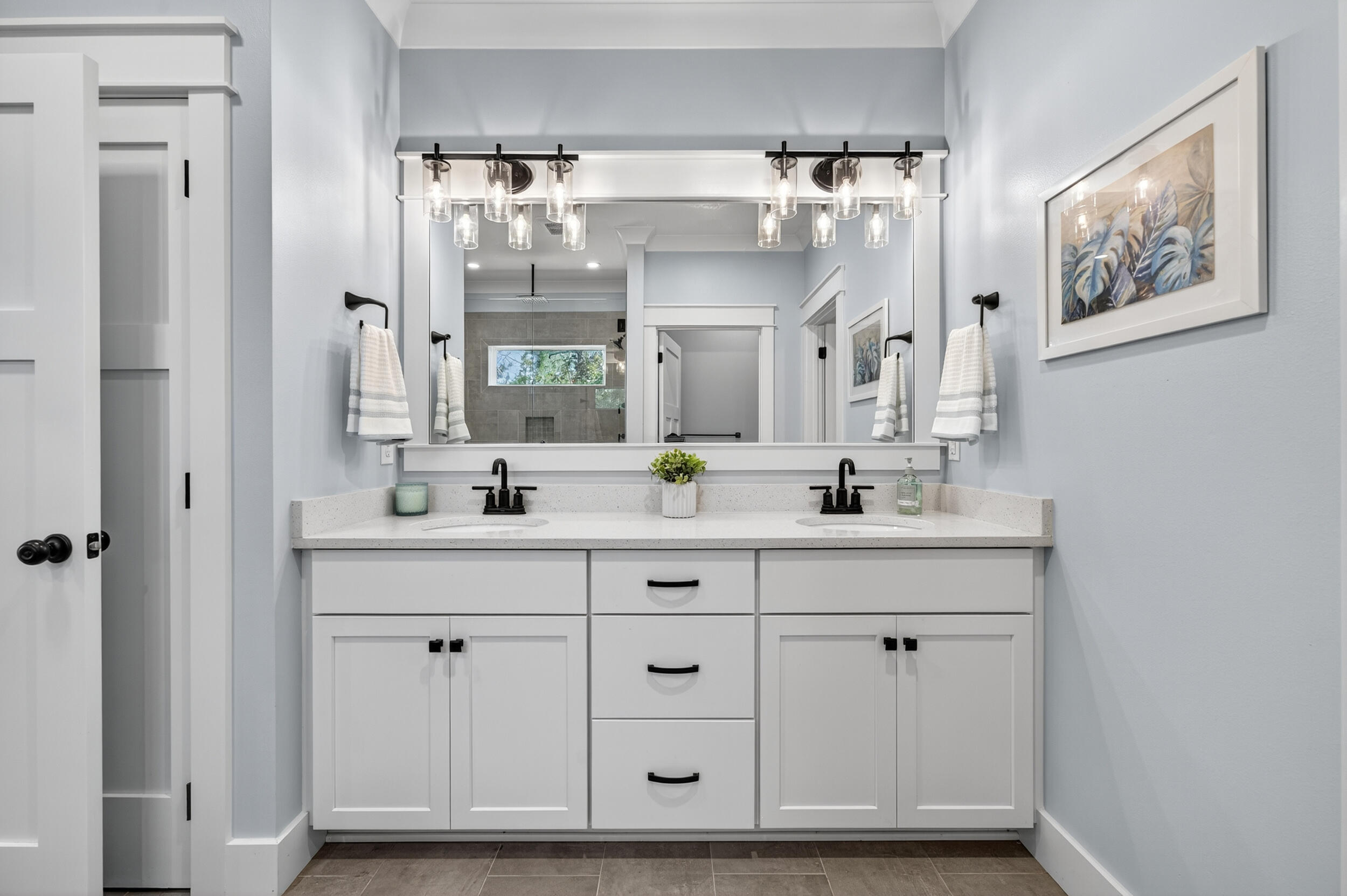 768 Long Road DeFuniak Springs, FL 32433 - Photo 37 of 106 a bathroom with double vanity sink and a mirror