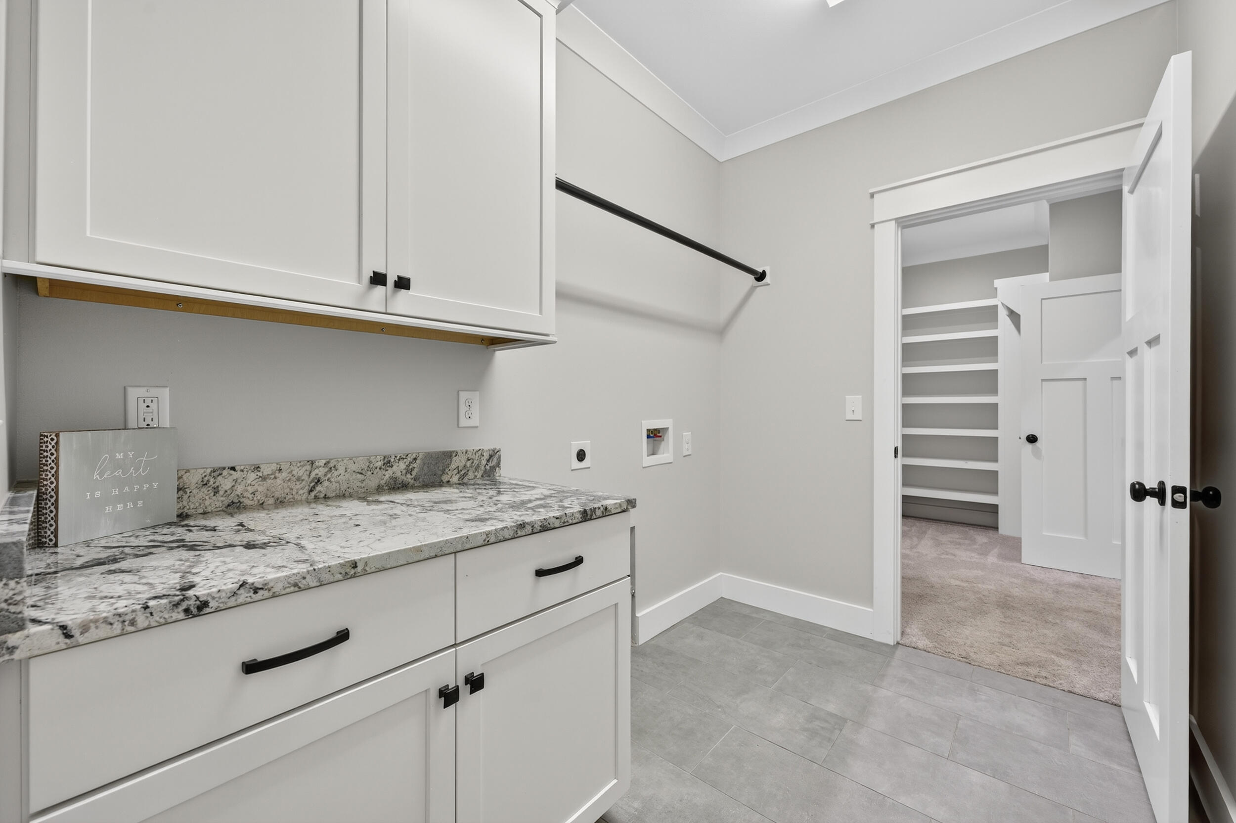 768 Long Road DeFuniak Springs, FL 32433 - Photo 42 of 106 a kitchen with a sink and cabinets