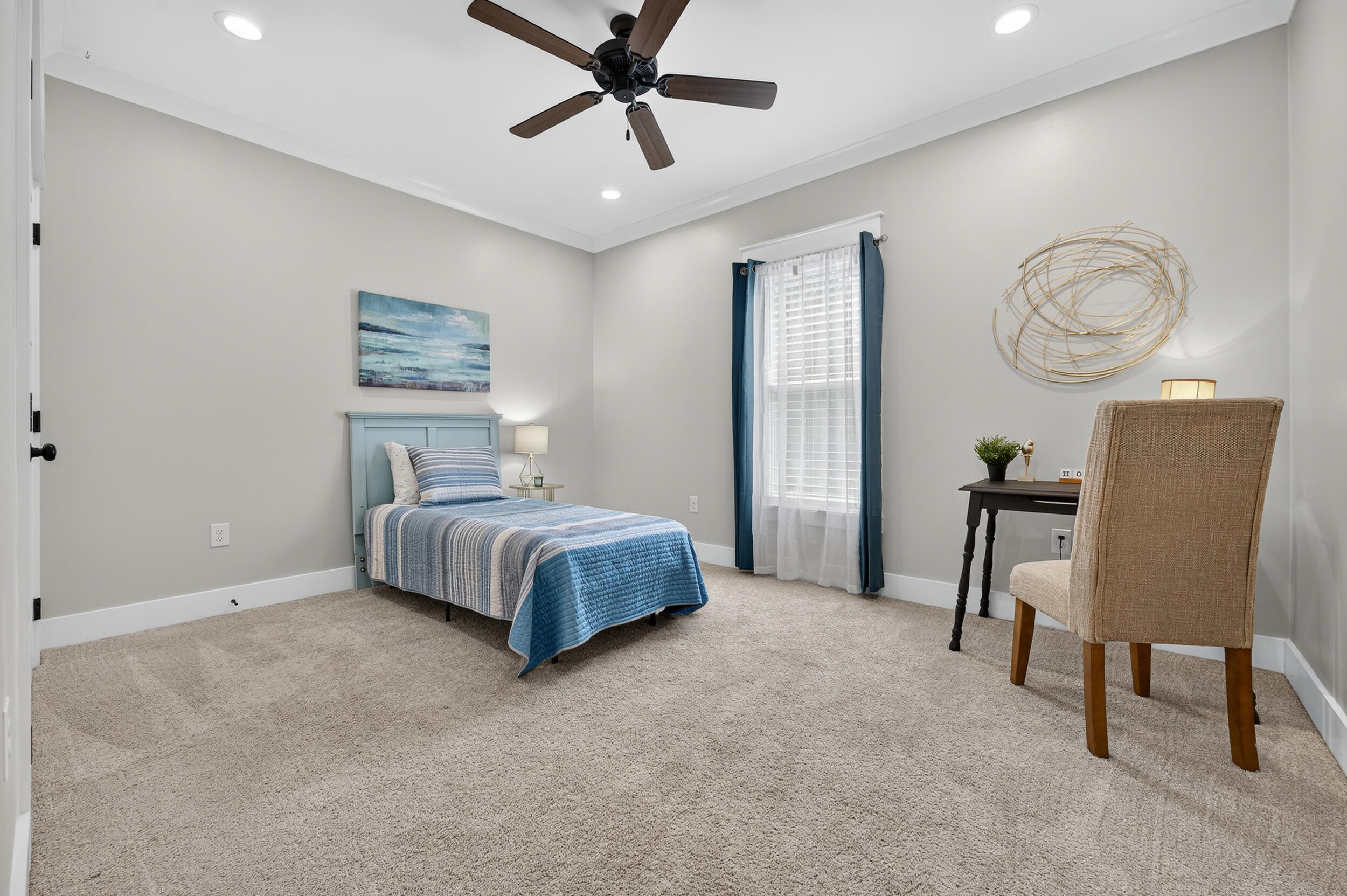 768 Long Road DeFuniak Springs, FL 32433 - Photo 46 of 106 a bedroom with a bed and a chandelier