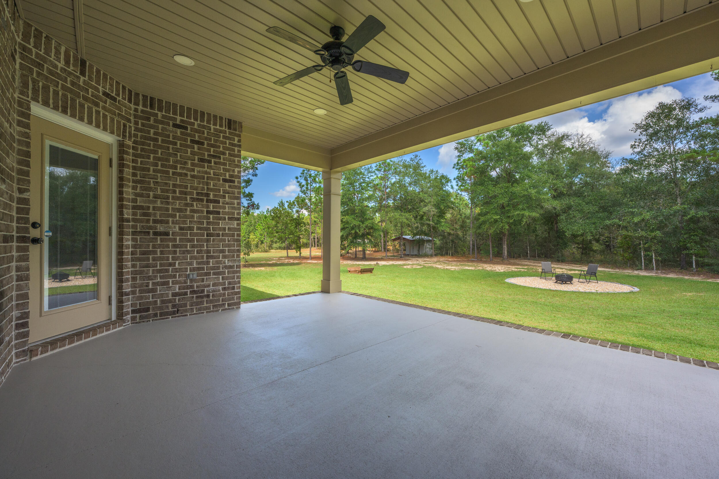 768 Long Road DeFuniak Springs, FL 32433 - Photo 66 of 106 a view of a house with a swimming pool