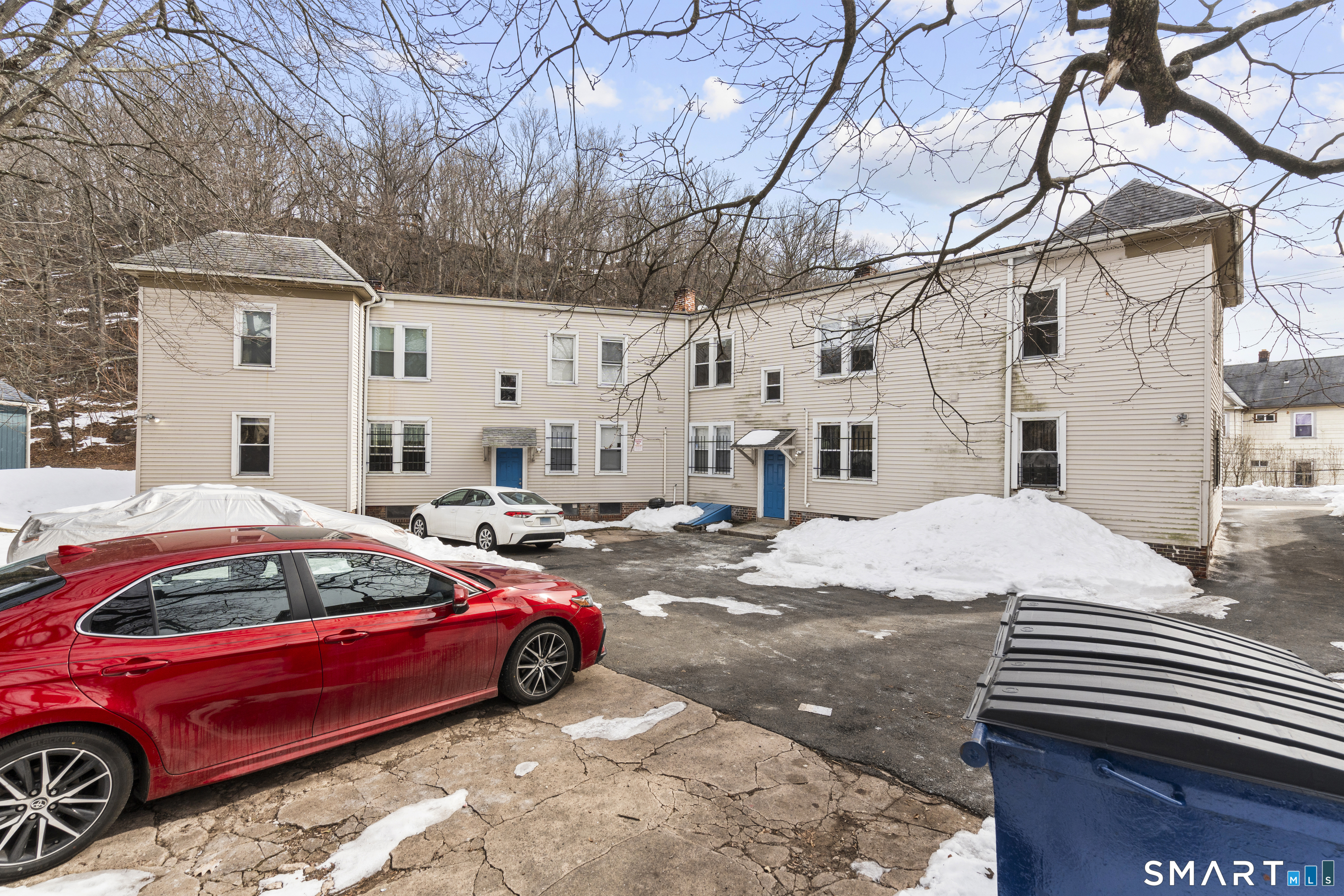 76 Ridge Street New Haven, CT 06511 - Photo 3 of 19 a cars parked in front of a house