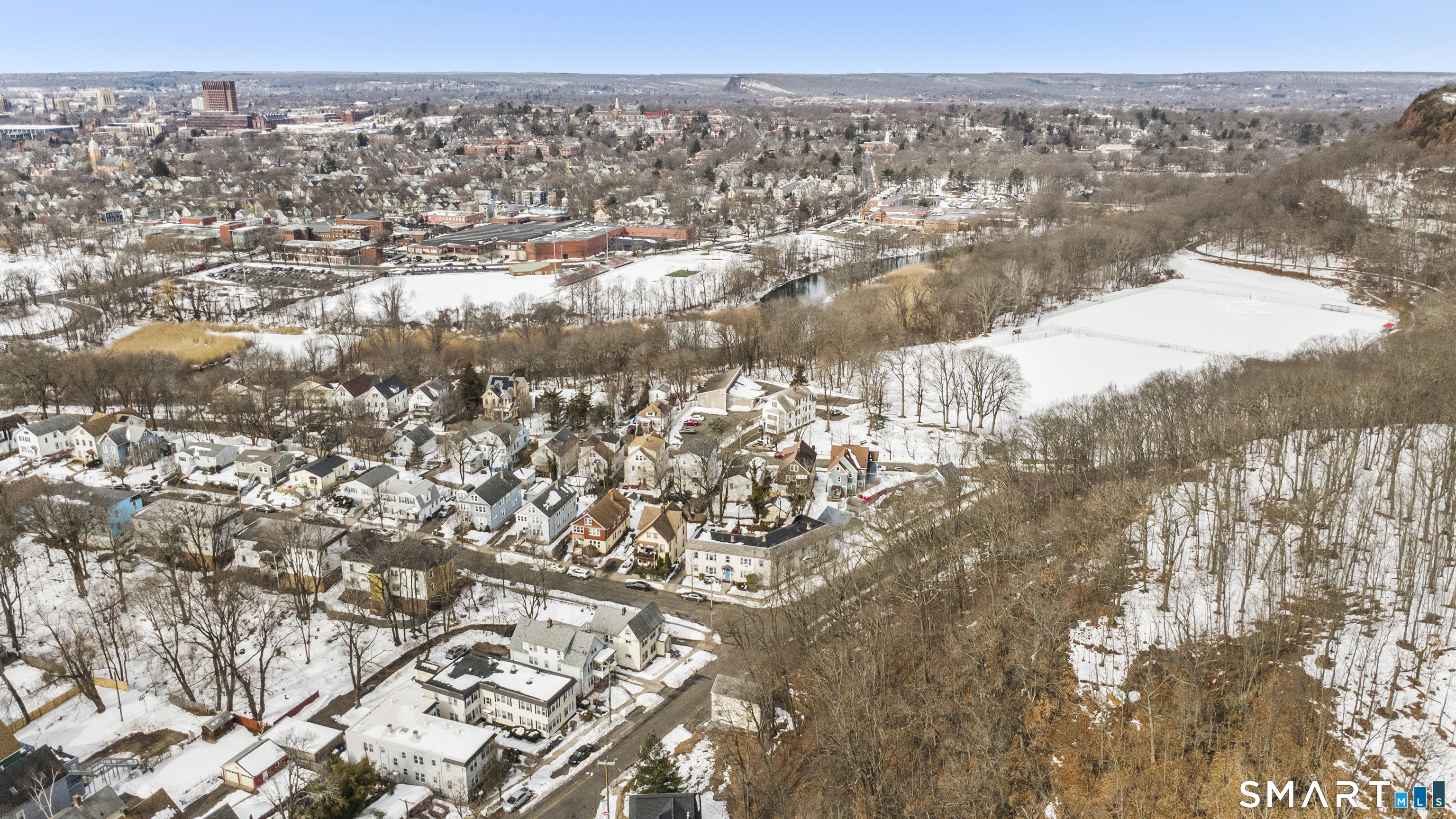 76 Ridge Street New Haven, CT 06511 - Photo 9 of 19 an aerial view of house with yard and mountain view in back