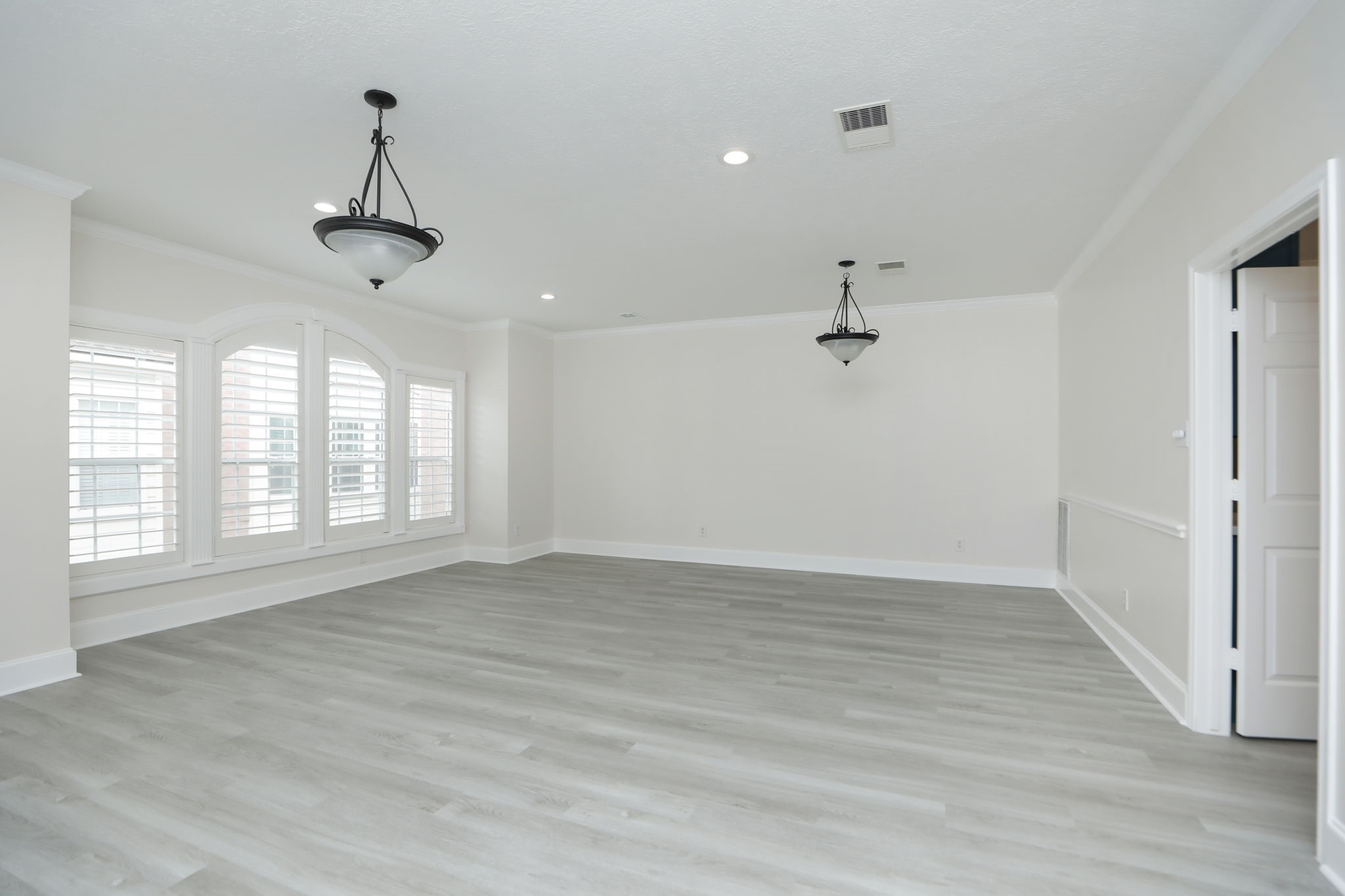 1893 Ewing Street Houston, TX 77004 - Photo 11 of 39 a view of an empty room with a window