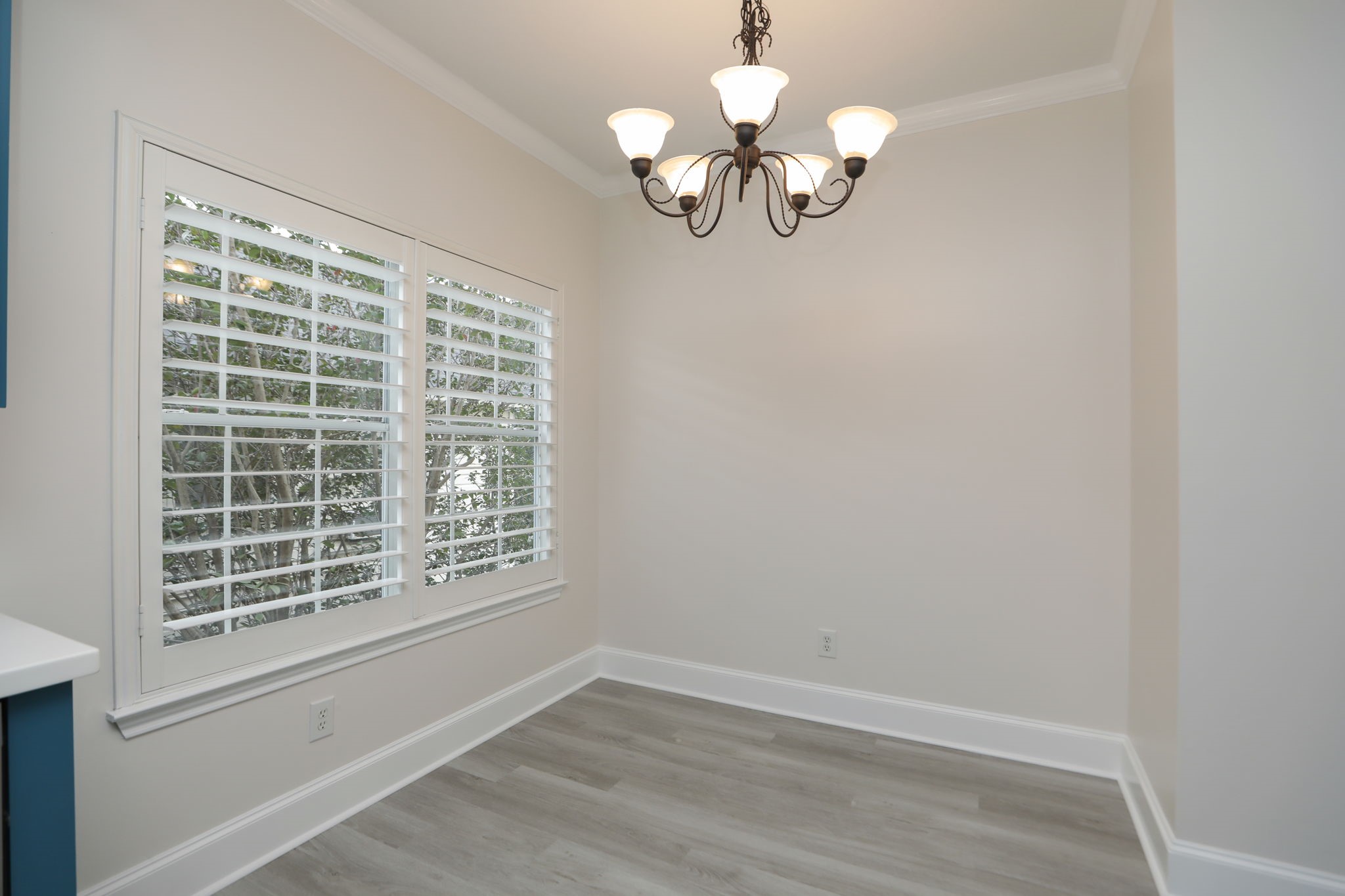 1893 Ewing Street Houston, TX 77004 - Photo 22 of 39 wooden floor in an empty room with a window