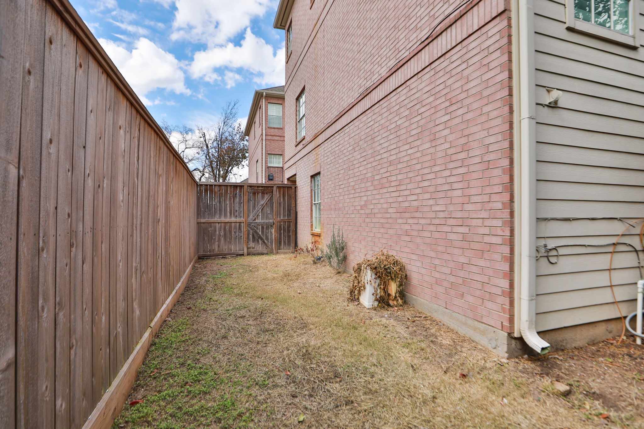 1893 Ewing Street Houston, TX 77004 - Photo 36 of 39 a view of a house with backyard and stairs