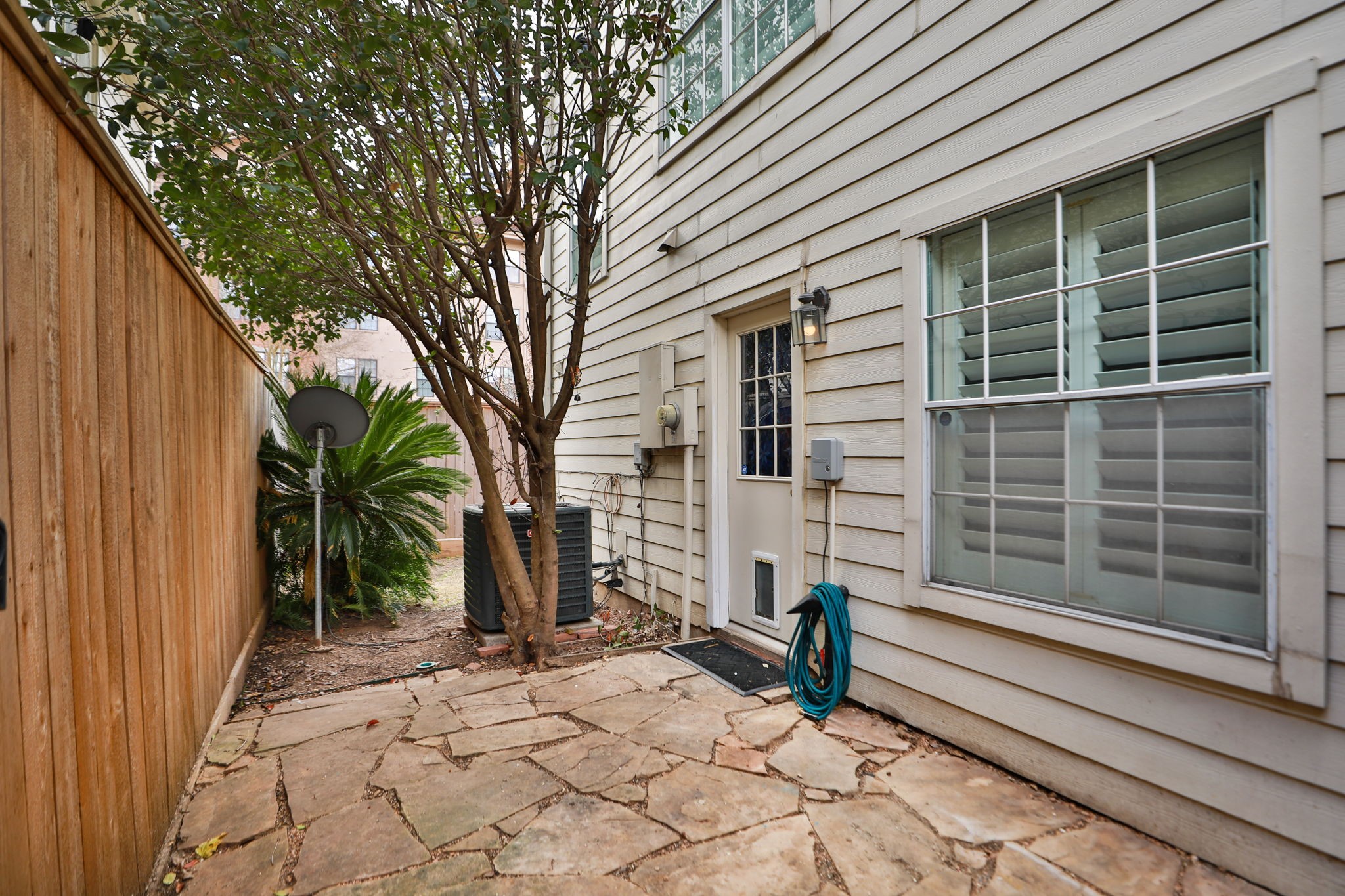 1893 Ewing Street Houston, TX 77004 - Photo 38 of 39 a view of a house with a yard