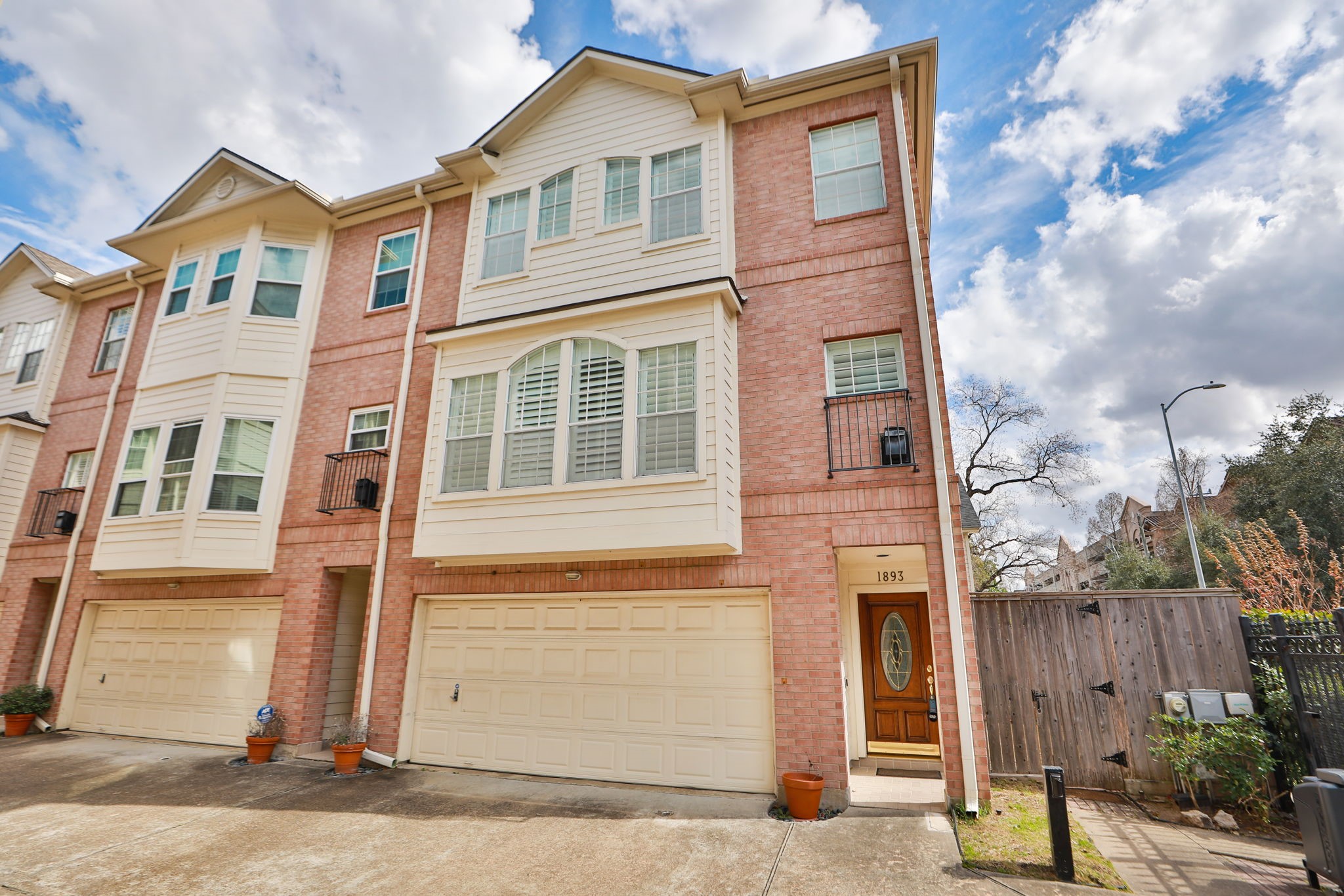 1893 Ewing Street Houston, TX 77004 - Photo 39 of 39 a front view of a house with a yard