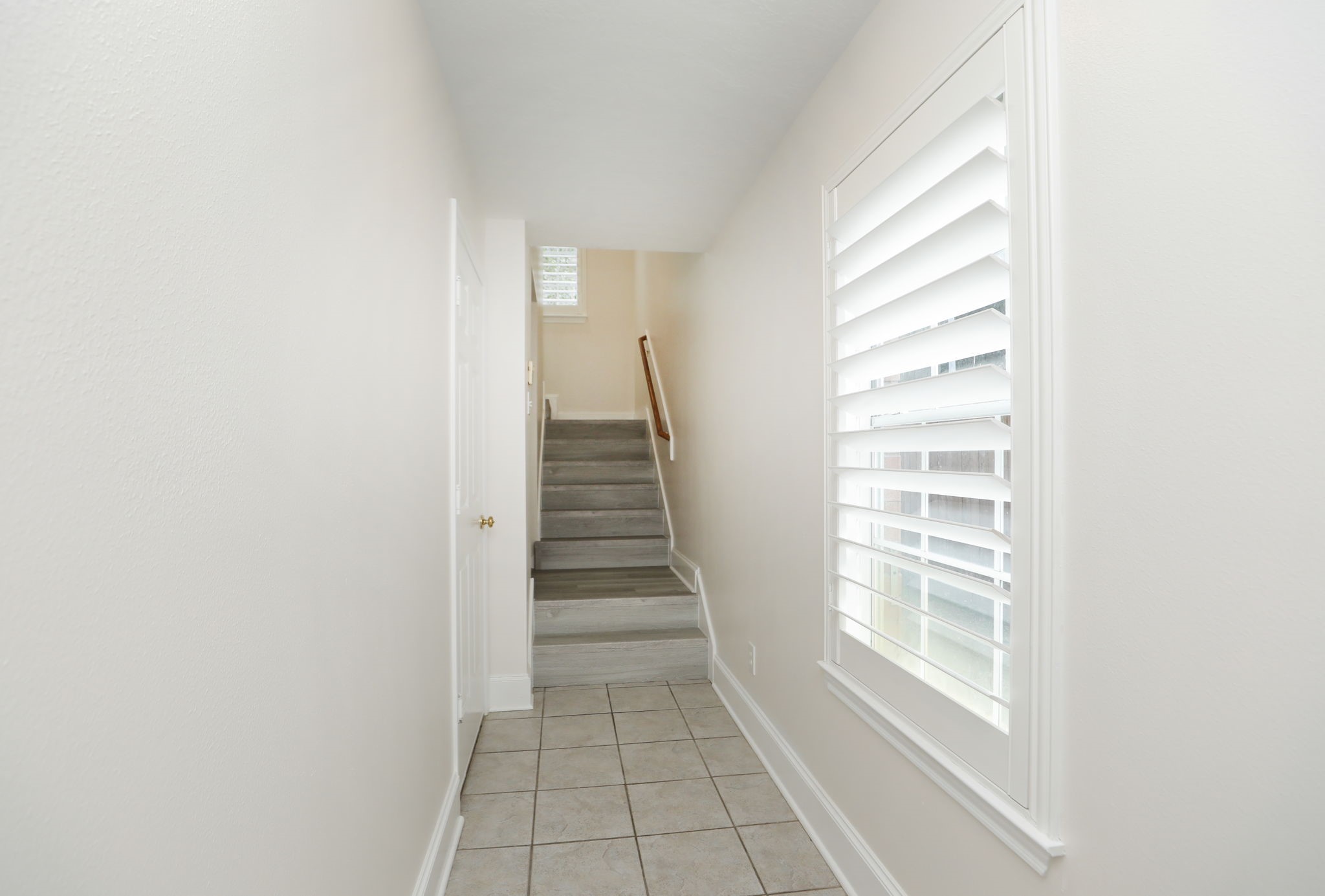 1893 Ewing Street Houston, TX 77004 - Photo 6 of 39 a view of an empty room with a window