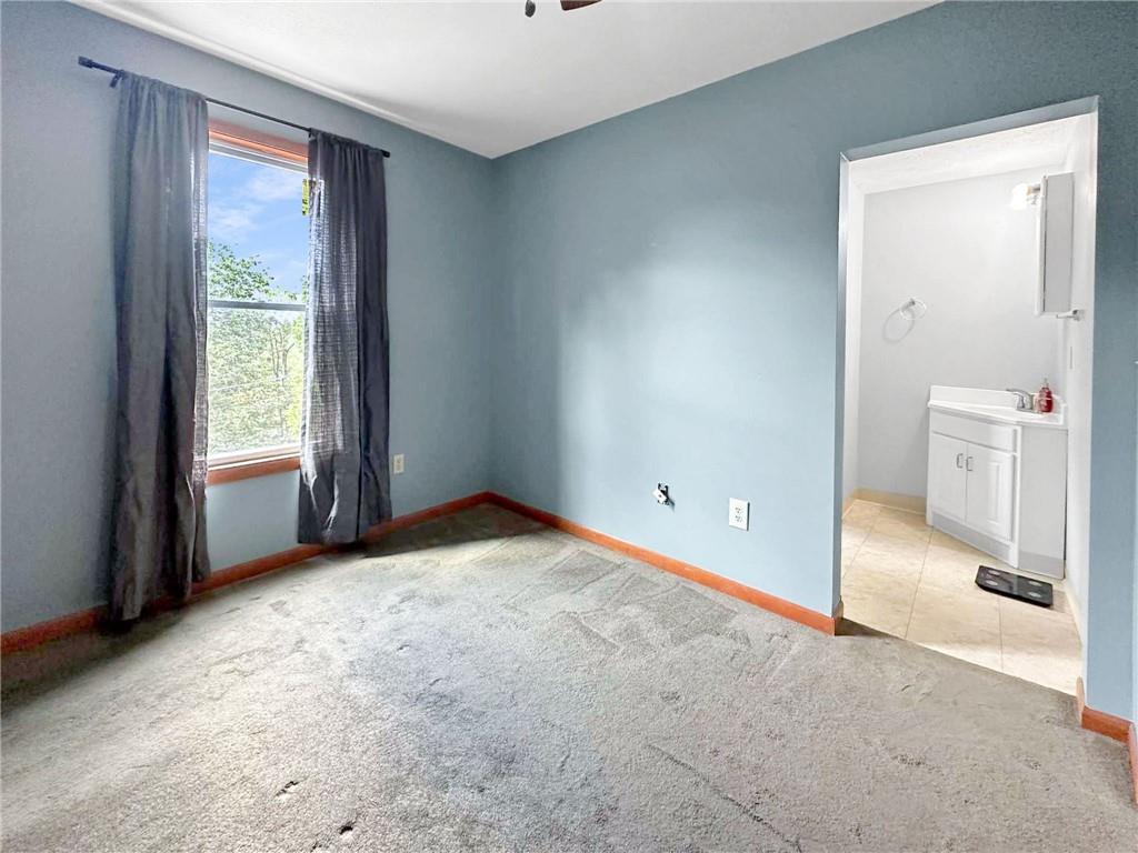 148 Oak Spring Road Canonsburg, PA 15317 - Photo 23 of 34 a view of an empty room with a window