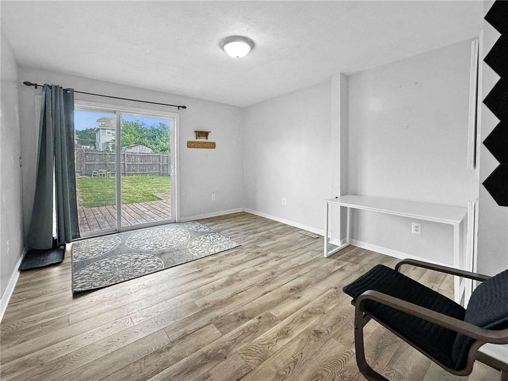 148 Oak Spring Road Canonsburg, PA 15317 - Photo 6 of 34 a view of an empty room and wooden floor