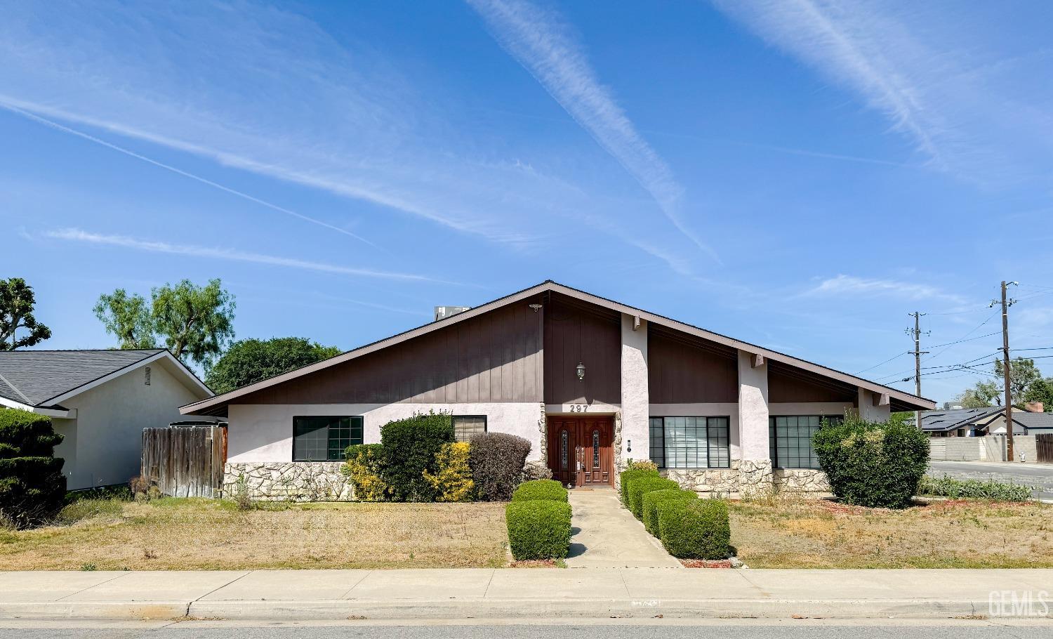 Restricted Address Shafter, CA 93263 - Photo 1 of 28 a front view of a house with a yard