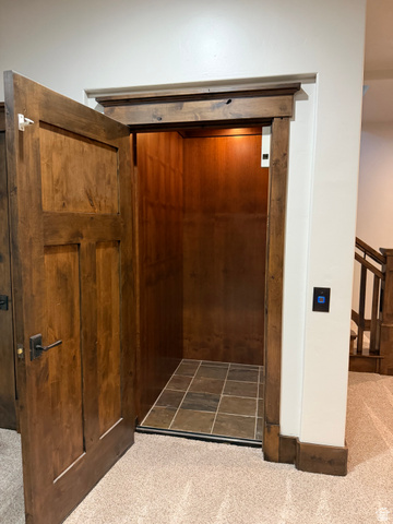 4536 North 475 East Provo, UT 84604 - Photo 18 of 65 Wood-paneled private elevator featuring recessed lighting and a tiled floor