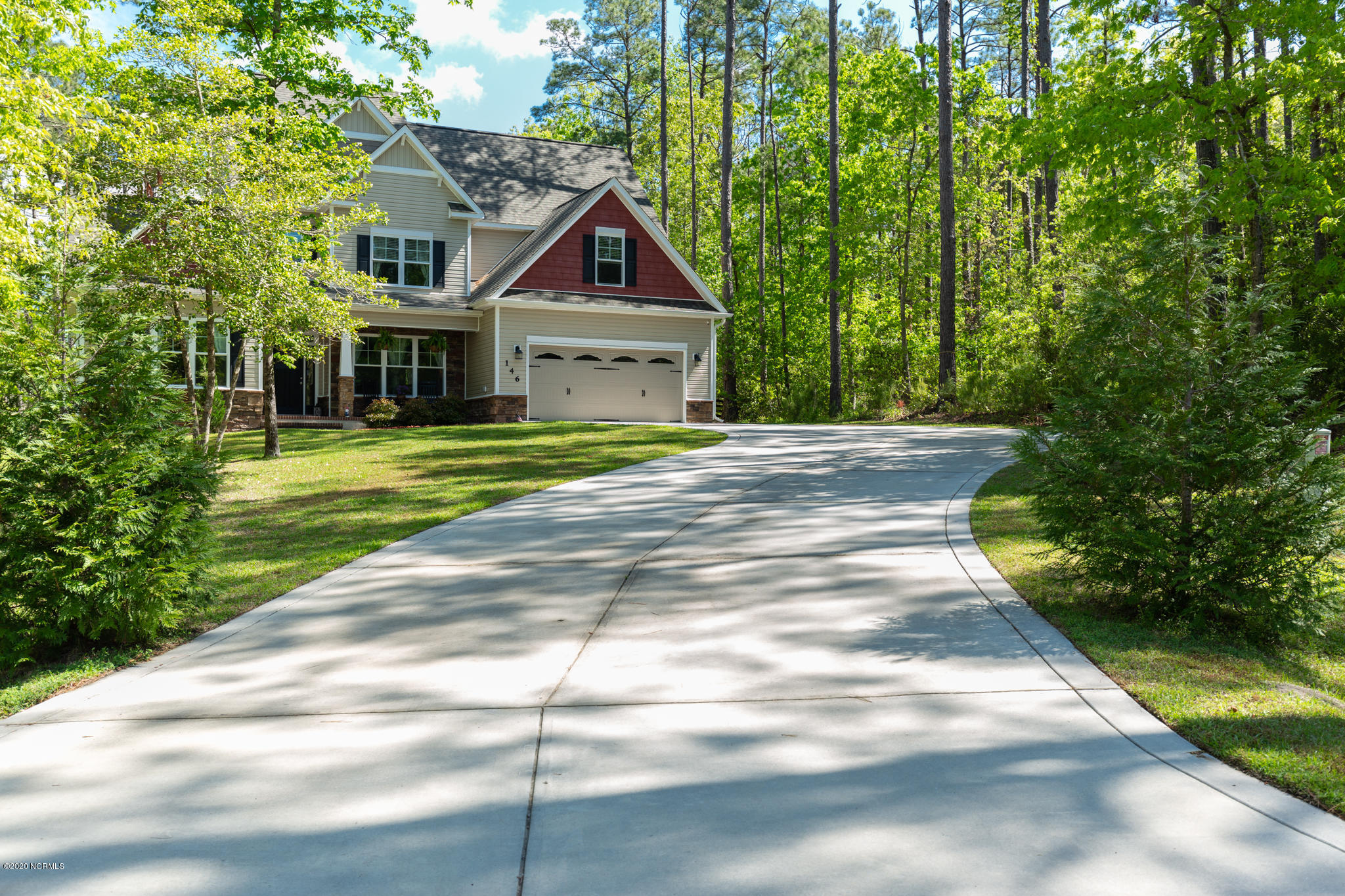 146 Forest Ridge Trail Stella, NC 28582 - Photo 5 of 58 Extra-wide driveway. Perfect for parking your boat or RV.