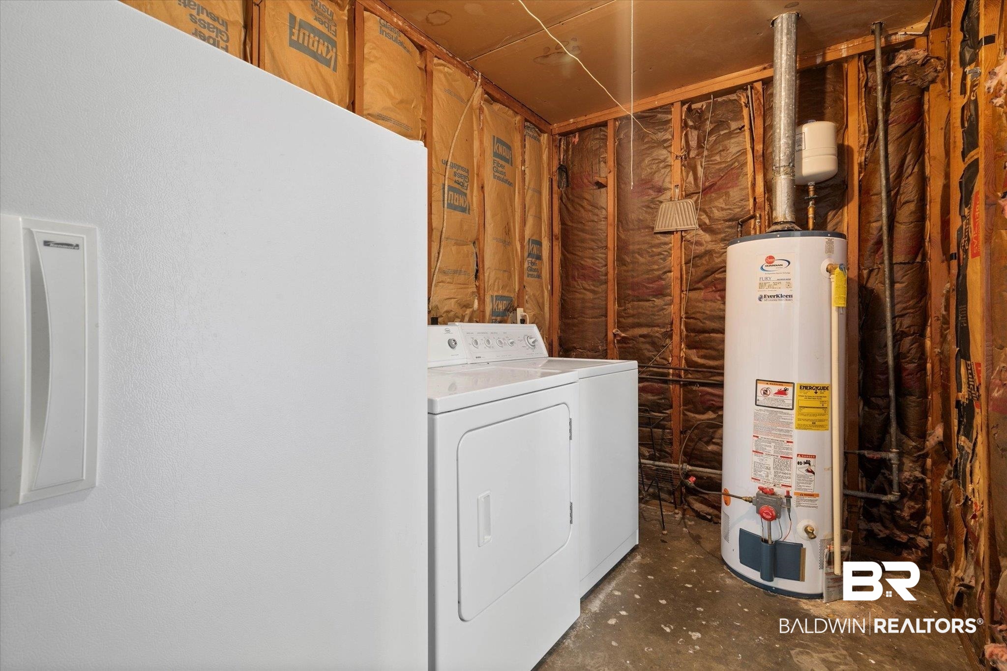 423 First Avenue Saraland, AL 36571 - Photo 16 of 20 Laundry area featuring gas water heater and separate washer and dryer