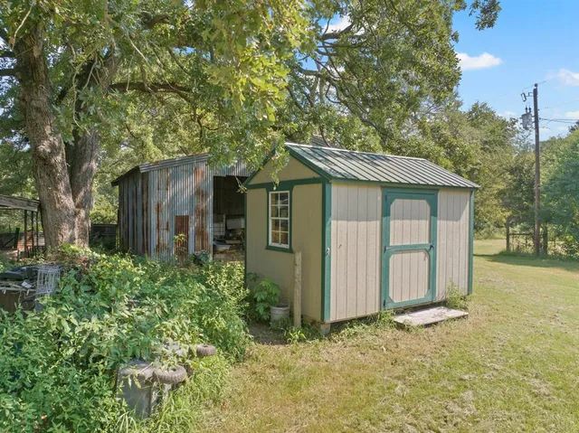 a house with a tree in front of it
