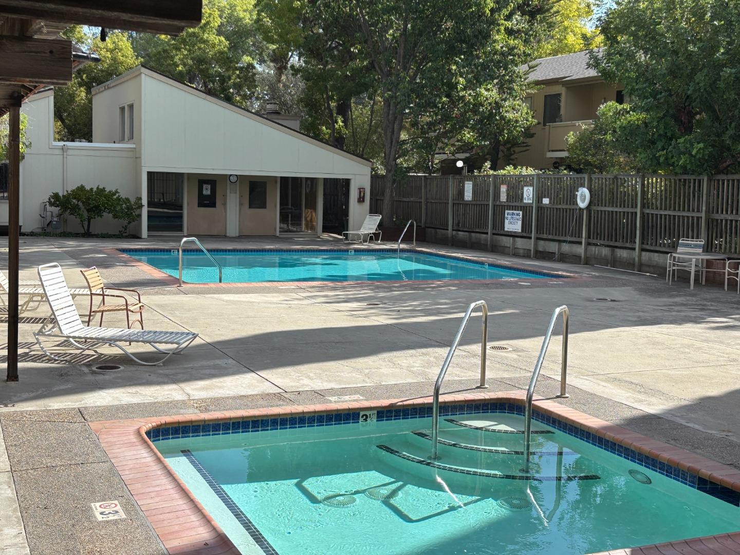 934 Kiely Boulevard, Unit B Santa Clara, CA 95051 - Photo 14 of 19 a view of a house with a swimming pool