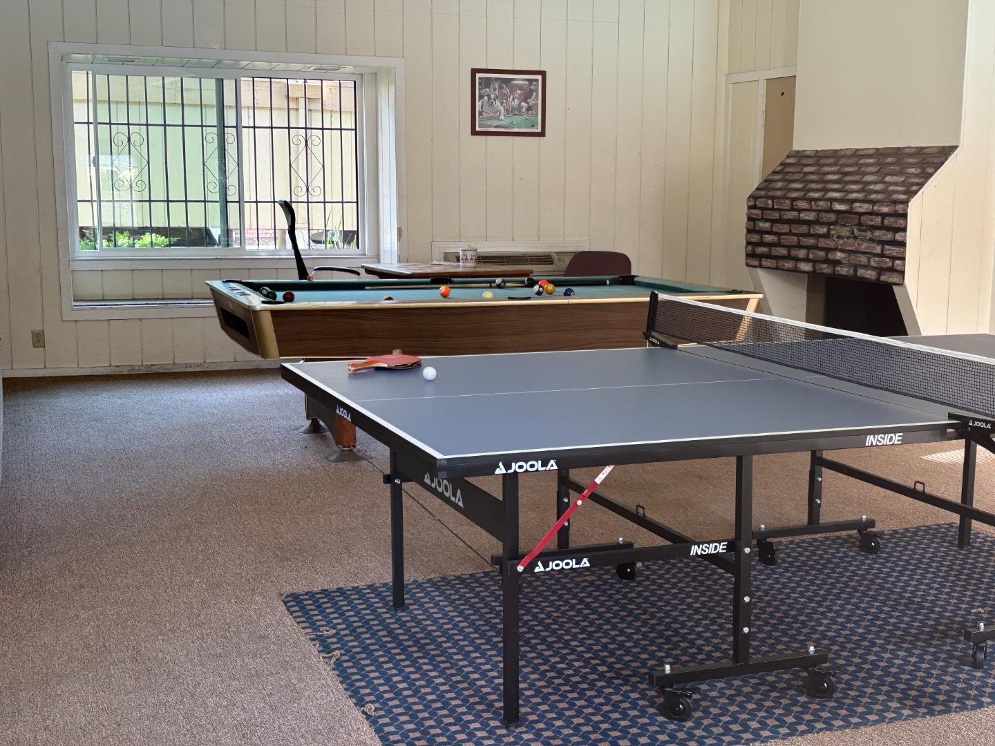 934 Kiely Boulevard, Unit B Santa Clara, CA 95051 - Photo 15 of 19 a room with table chairs and windows