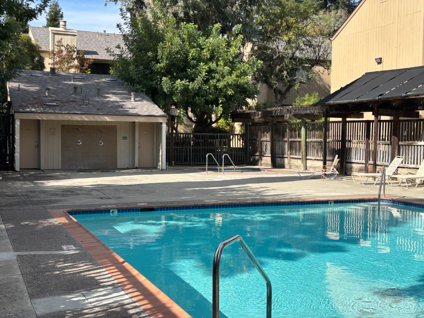 934 Kiely Boulevard, Unit B Santa Clara, CA 95051 - Photo 18 of 19 a swimming pool with outdoor seating and yard
