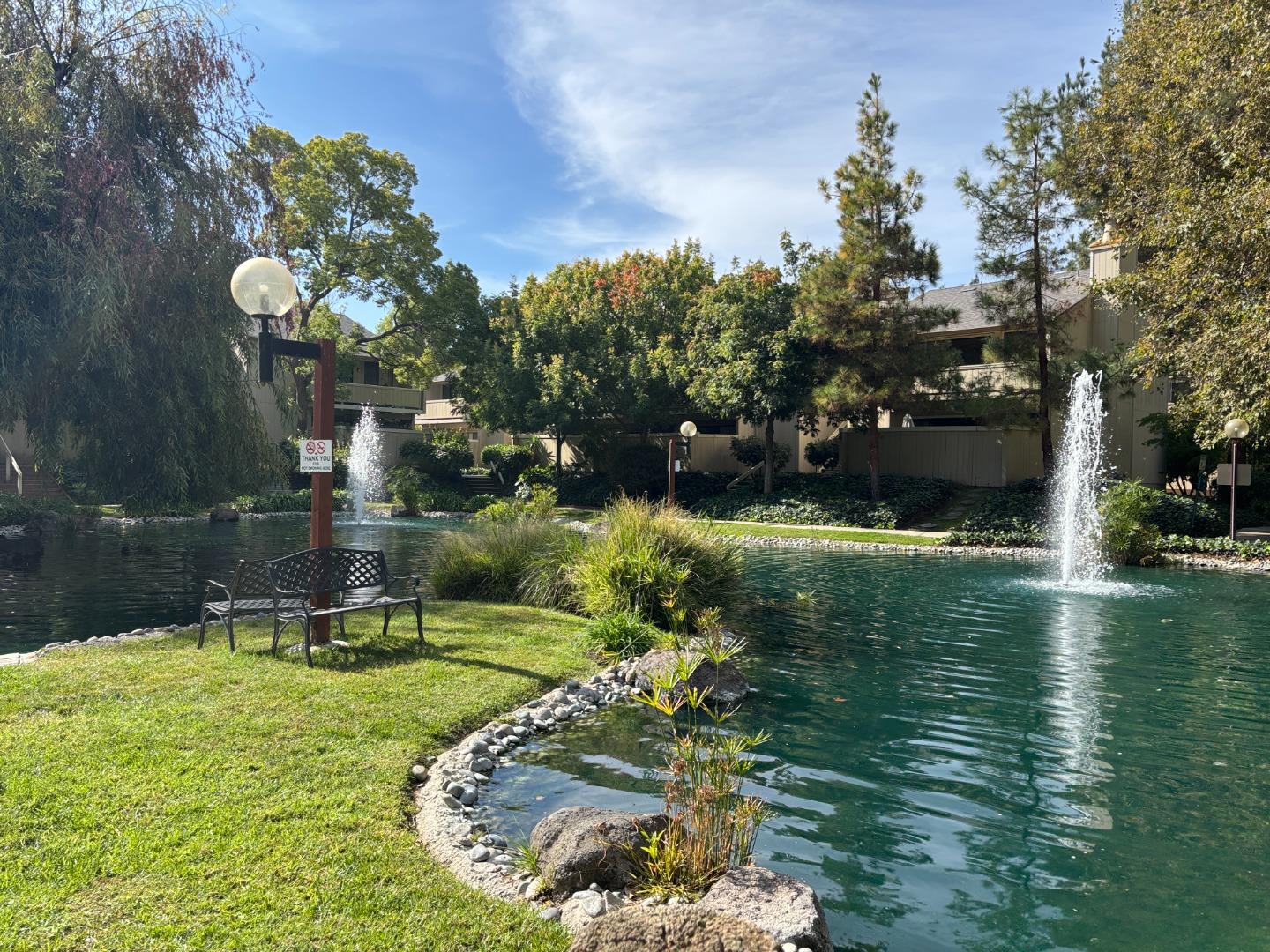 934 Kiely Boulevard, Unit B Santa Clara, CA 95051 - Photo 19 of 19 a view of a lake with a yard