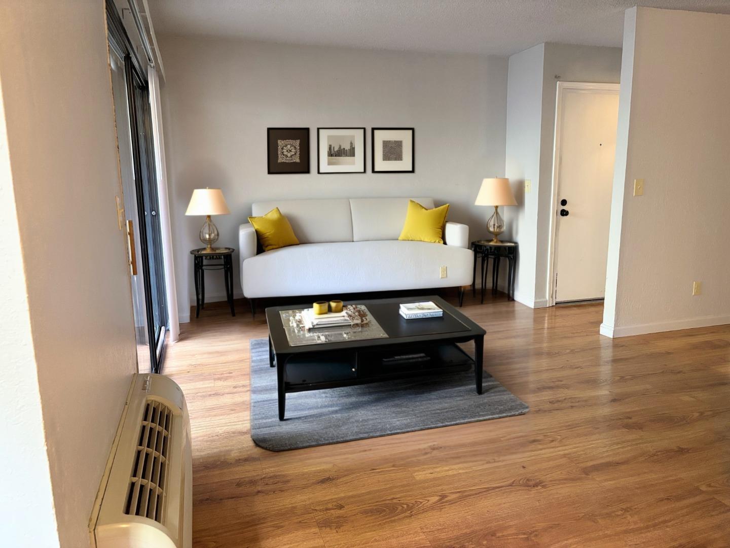 934 Kiely Boulevard, Unit B Santa Clara, CA 95051 - Photo 3 of 19 a living room with furniture and wooden floor