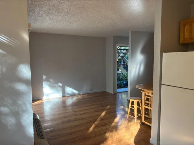 a view of livingroom with furniture and wooden floor