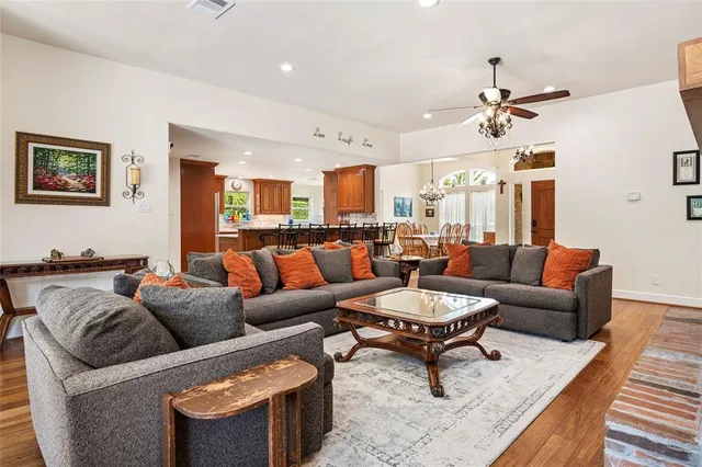 a living room with furniture and a rug