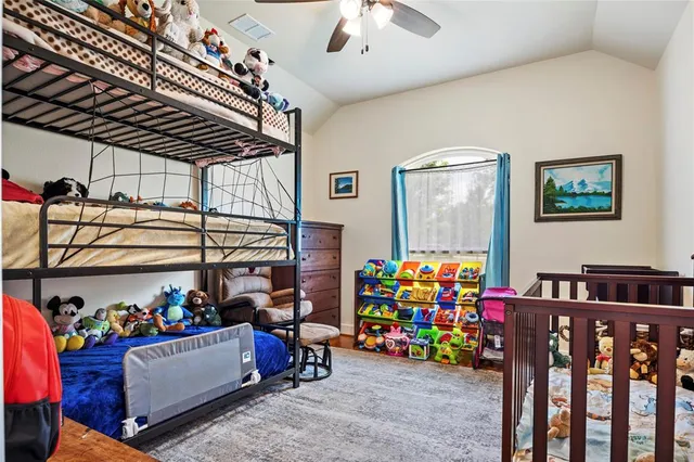 a living room filled with lots of furniture