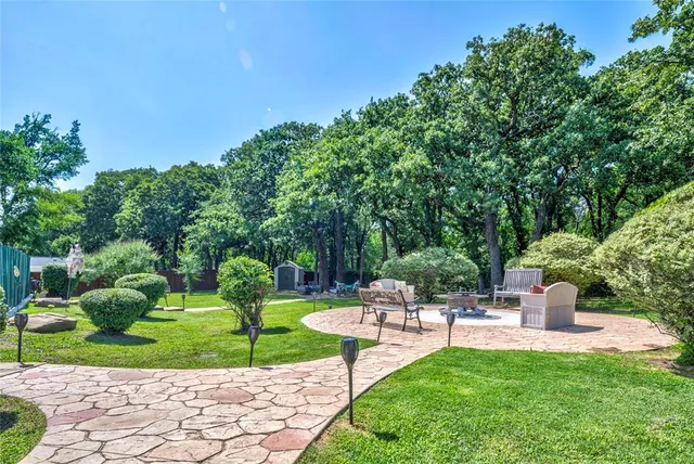 a garden view with a seating space