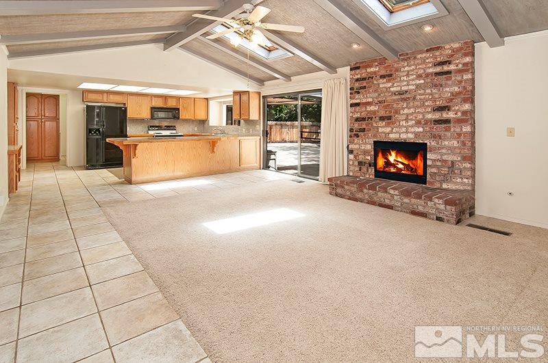 4 Suda Way Reno, NV 89509 - Photo 3 of 24 a view of a livingroom with a fireplace