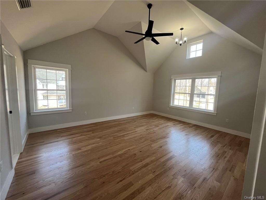 268 Lybolt Road Middletown, NY 10941 - Photo 12 of 28 a view of an empty room with wooden floor and a window