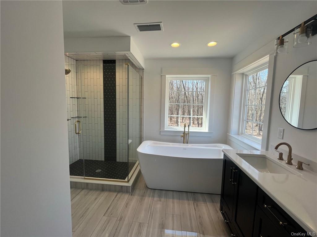 268 Lybolt Road Middletown, NY 10941 - Photo 15 of 28 a spacious bathroom with a tub sink and mirror