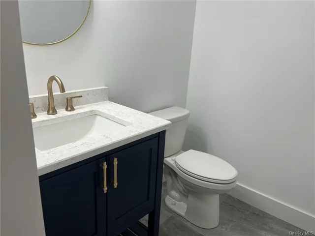 a bathroom with a sink and a toilet
