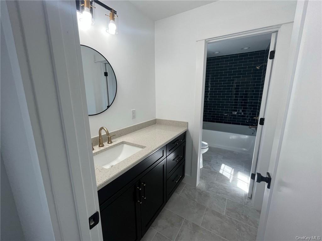 268 Lybolt Road Middletown, NY 10941 - Photo 25 of 28 a bathroom with a sink and mirror