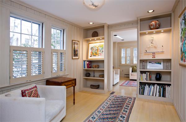 16 Cleveland Road Brookline, MA 02445 - Photo 7 of 8 a living room with furniture and a book shelf