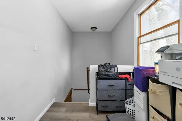 a bedroom with a bed and a walk in closet