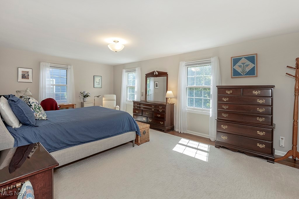 14711 South Woodland Road Cleveland, OH 44120 - Photo 16 of 31 The Oversized Master Bedroom Spans the Front of the Home and has Space for a King Bed, Furniture, and a Seating Area.