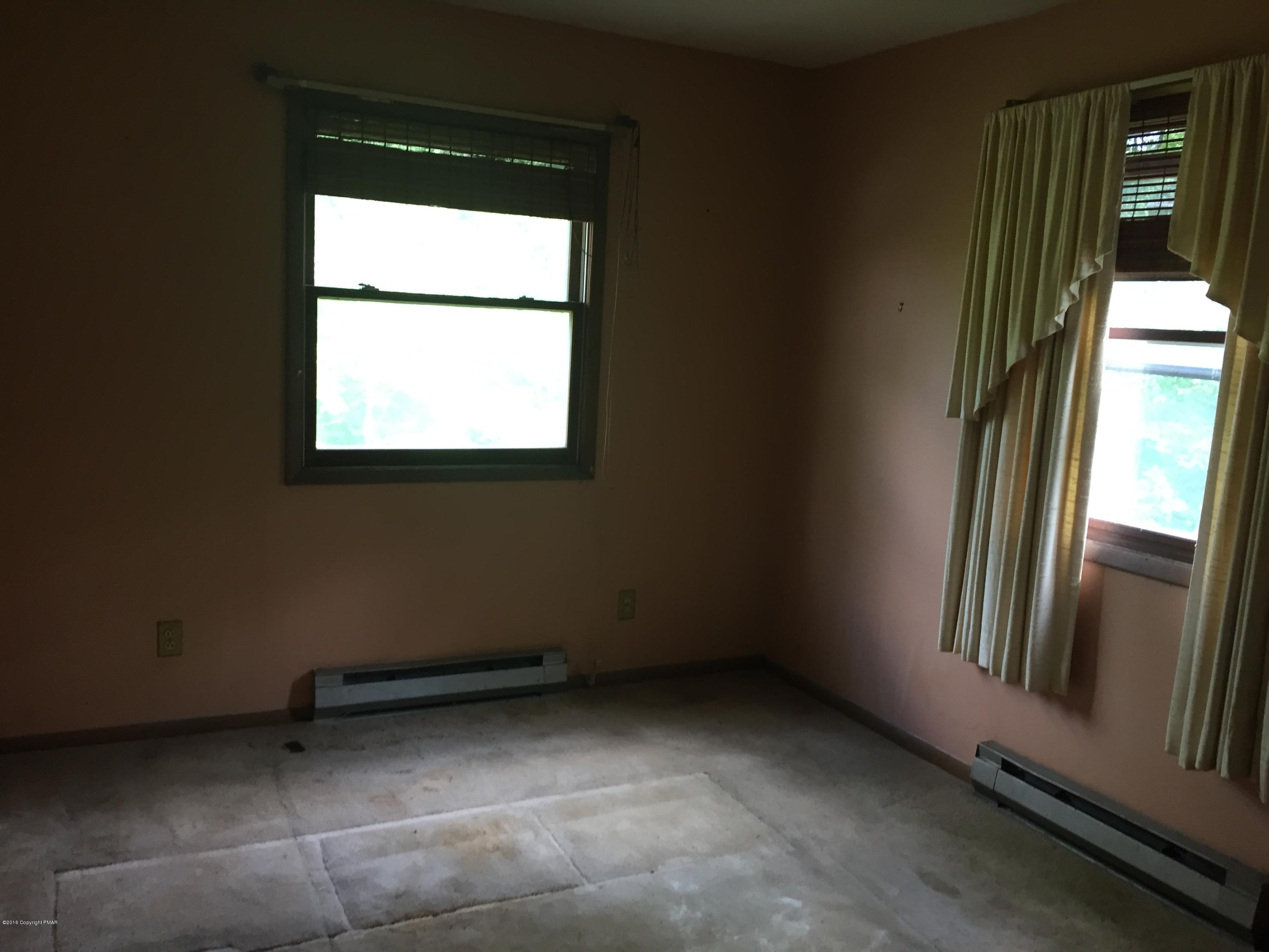 220 Lower Grandview Road Cresco, PA 18326 - Photo 10 of 10 a view of an empty room with a window