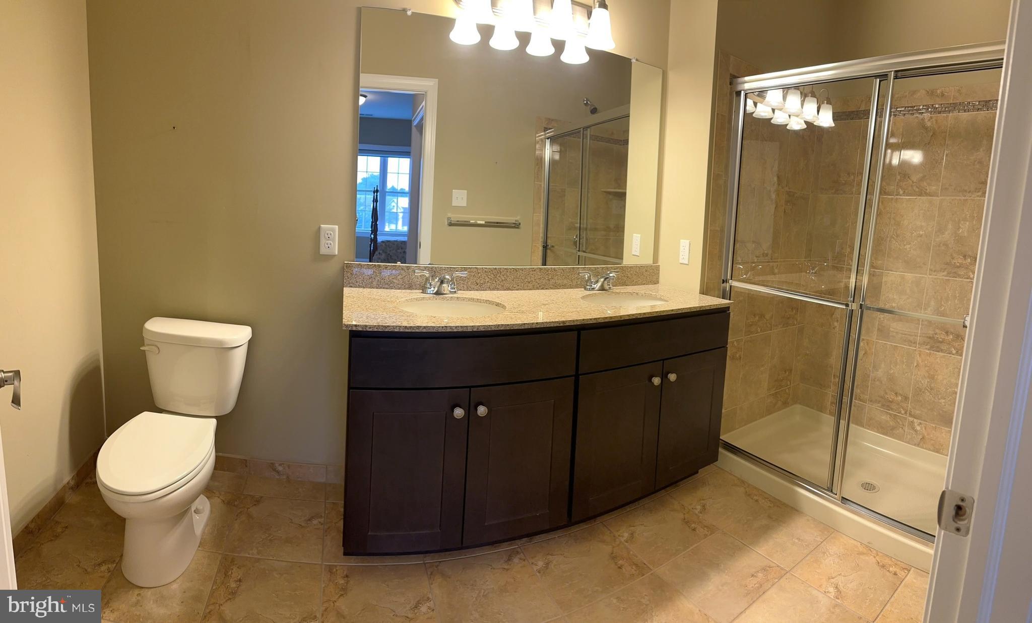 756 Street Road, Unit 17 Southampton, PA 18966 - Photo 18 of 31 a bathroom with a sink toilet and shower