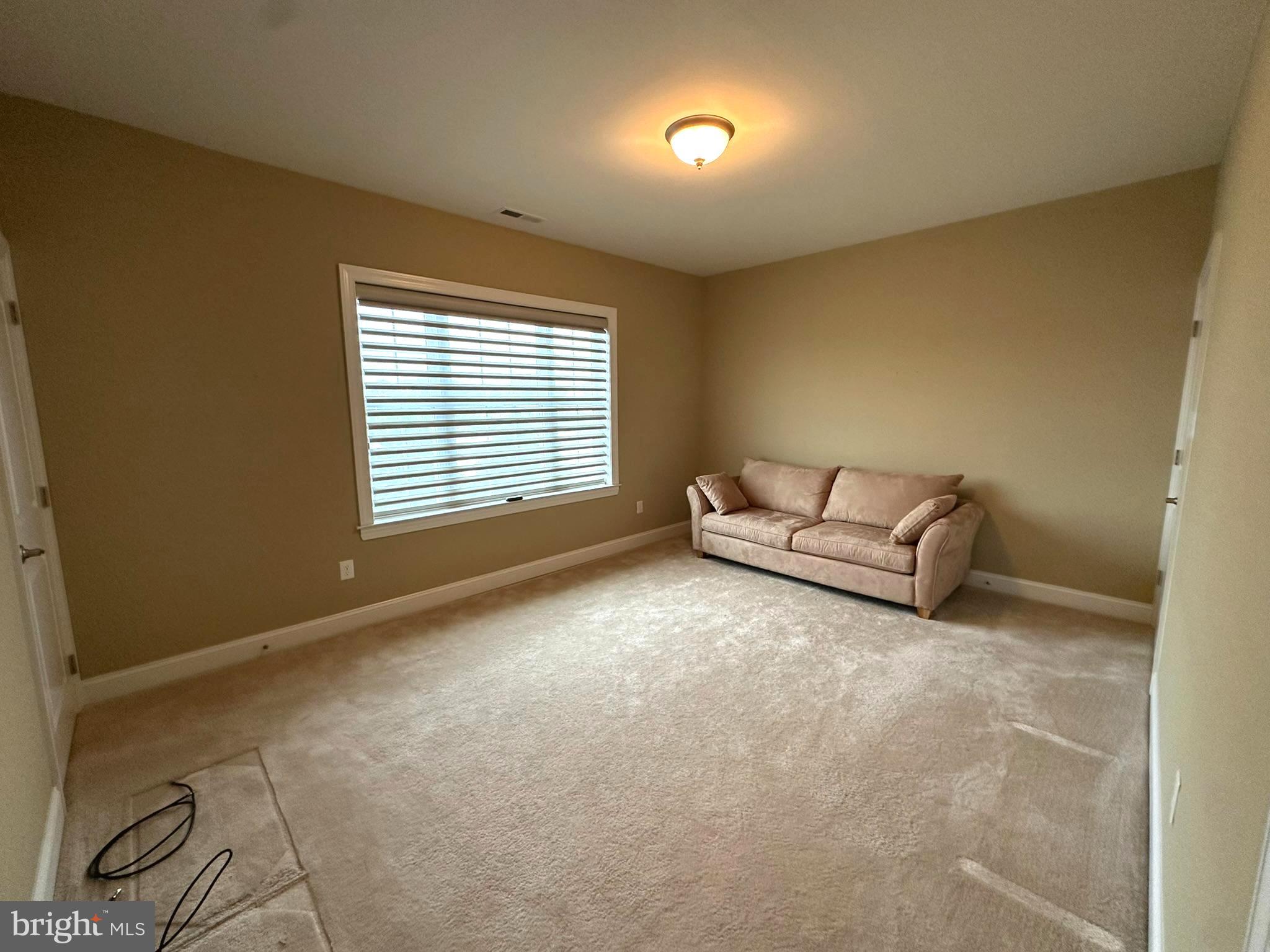 756 Street Road, Unit 17 Southampton, PA 18966 - Photo 20 of 31 a living room with furniture and a window