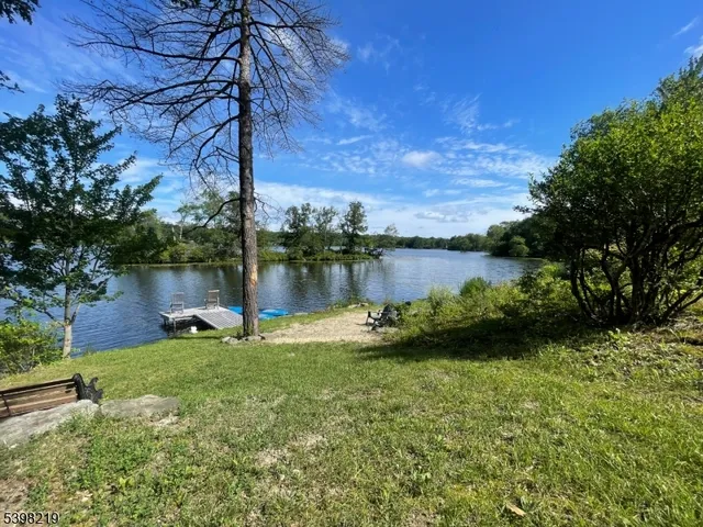 a view of a lake with a yard