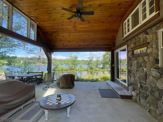 a view of a patio with a table chairs and a table