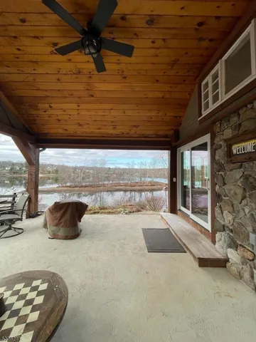 a view of water heater room with windows